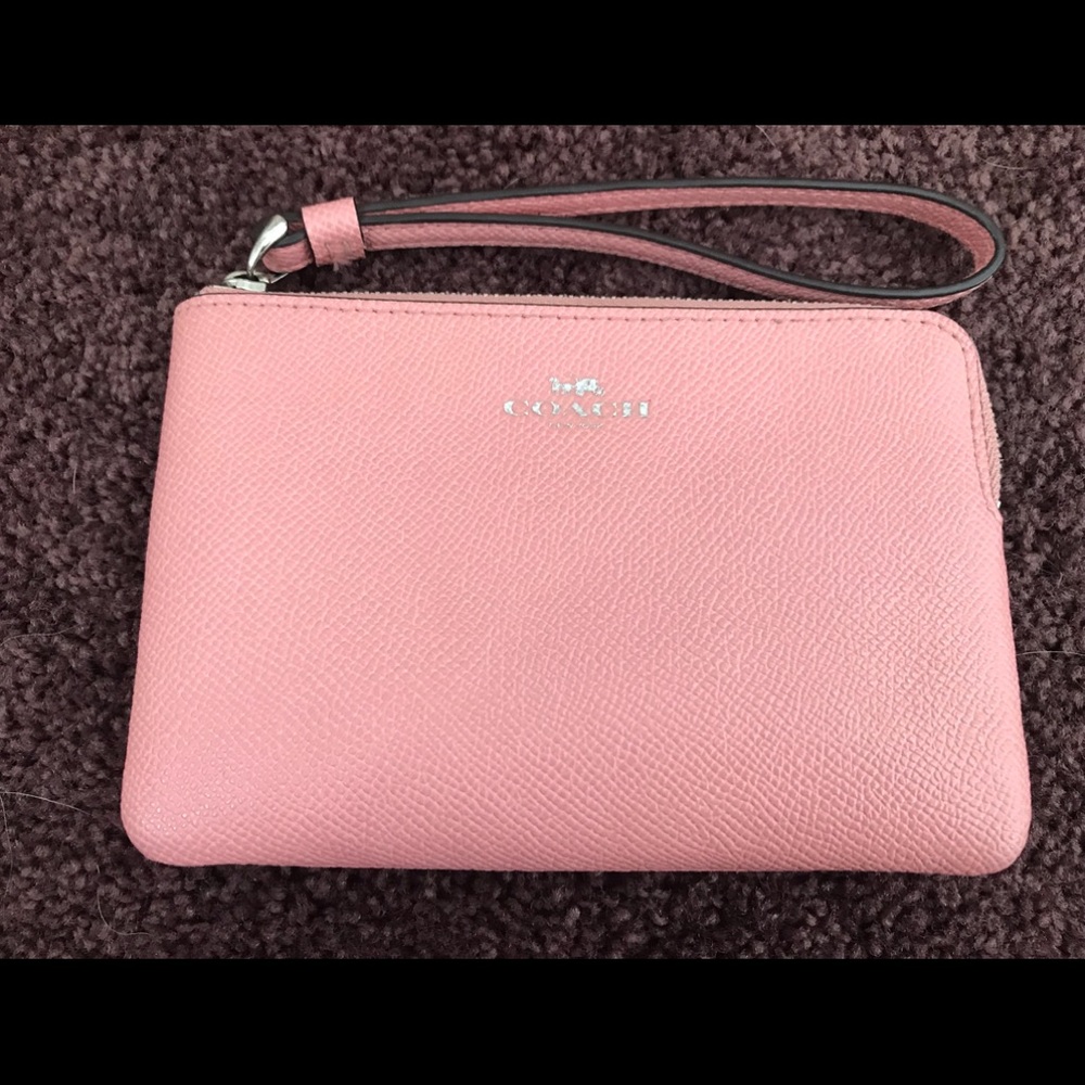 Pink leather coach wristlet